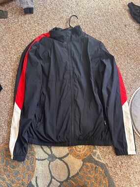 Divided Black Windbreaker with Red and White Sleeve Panels
